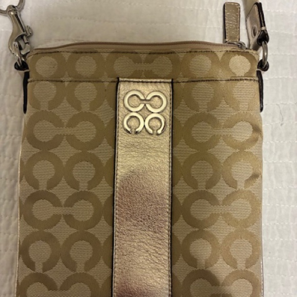 Coach Gold and Beige Crossbody Bag with unusual “C” symbol on purse.  BNWOT